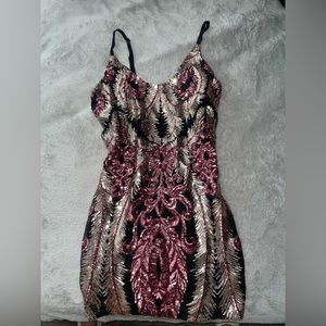 Super cute mini sequence dress. Perfect for night out it will make you stand out